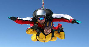 Two people skydiving in Seville